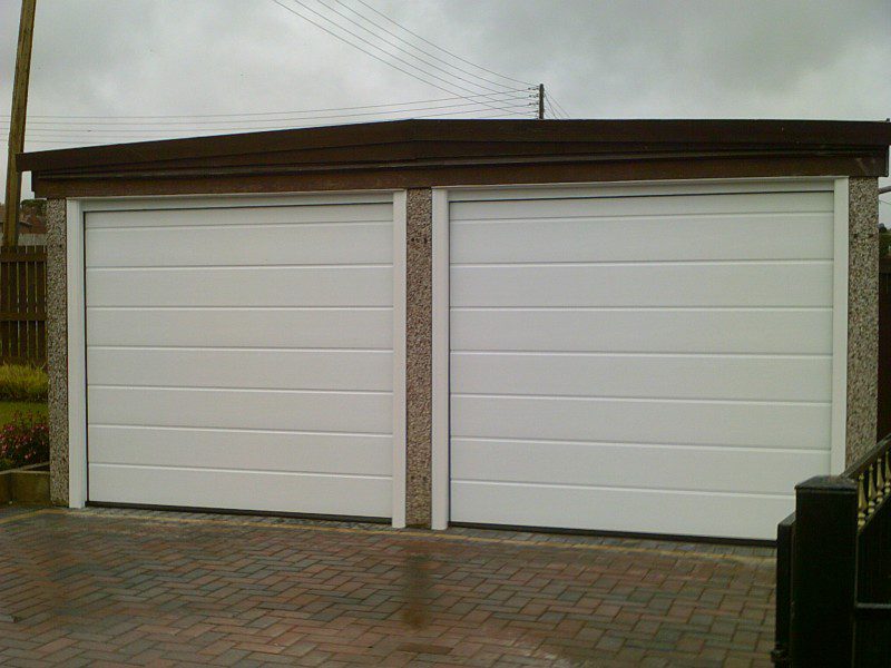 White Linear Sectional Garage Doors (After)