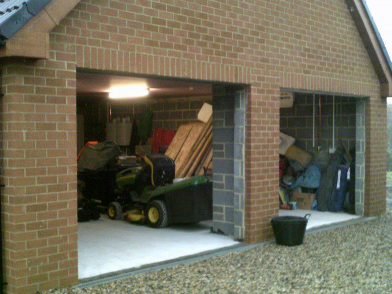 Golden Oak Sectional Garage Doors (Before)