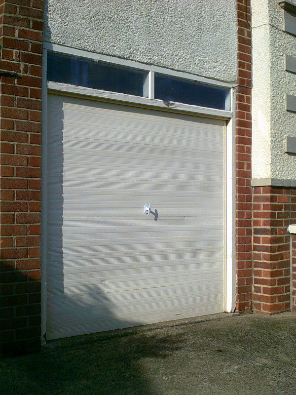 White Carlton Up & Over Garage Door (Before)