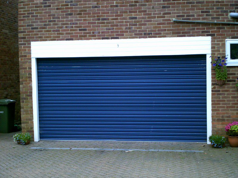 White Georgian Sectional Garage Door (Before)