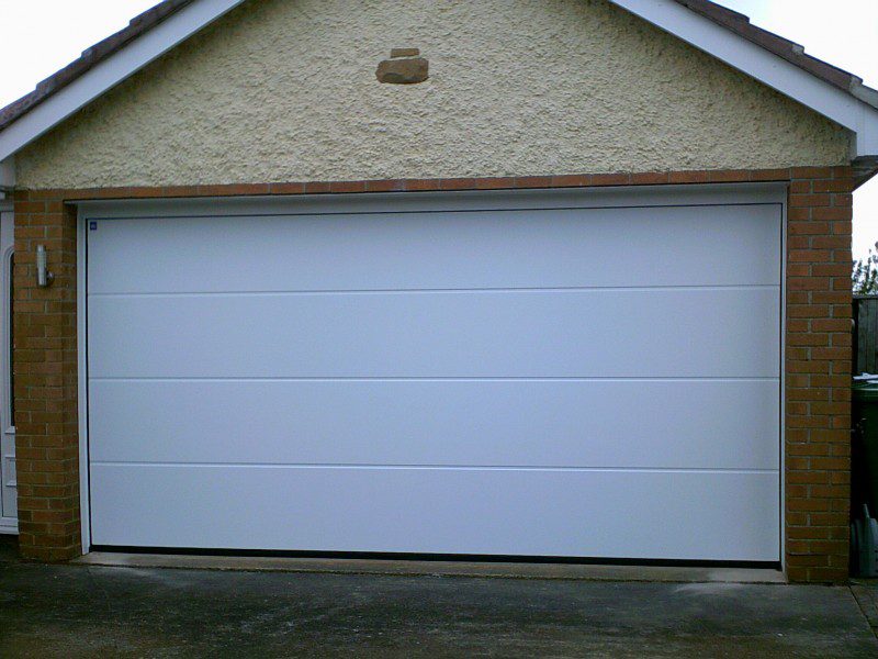 white rib Style Sectional Garage Door (After)