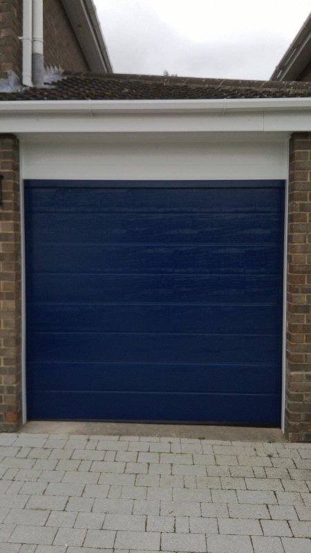 Blue Sectional Garage Door (After)