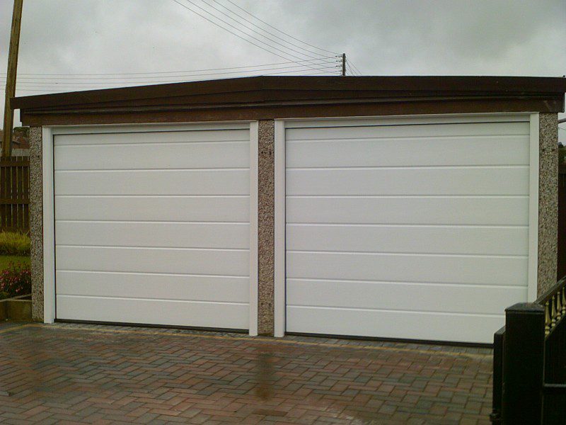 White Insulated Sectional Garage Doors (After)