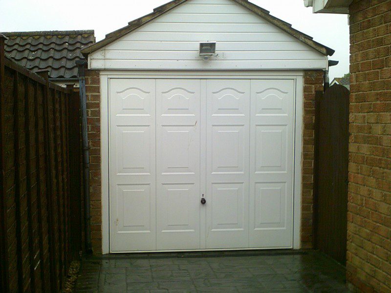 White Seceuroglide Remote Control Insulated Roller Garage Door (Before)