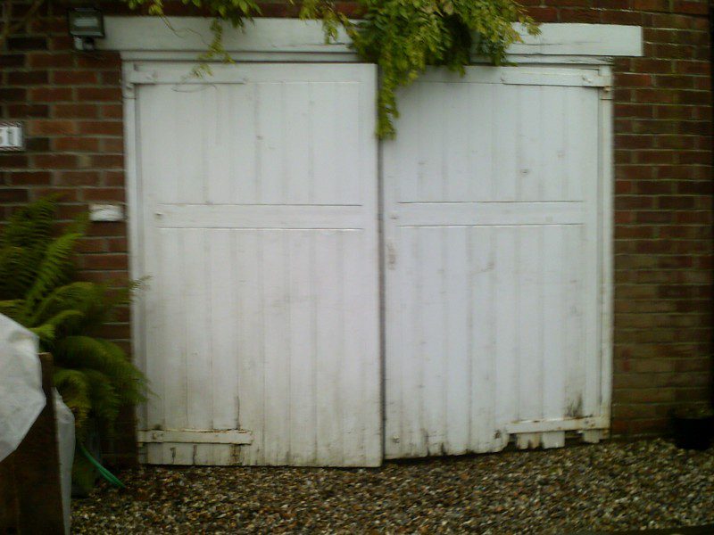 White Seceuroglide Remote Control Insulated Roller Garage Door (Before)