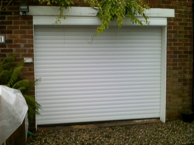 White Seceuroglide Remote Control Insulated Roller Garage Door (After)
