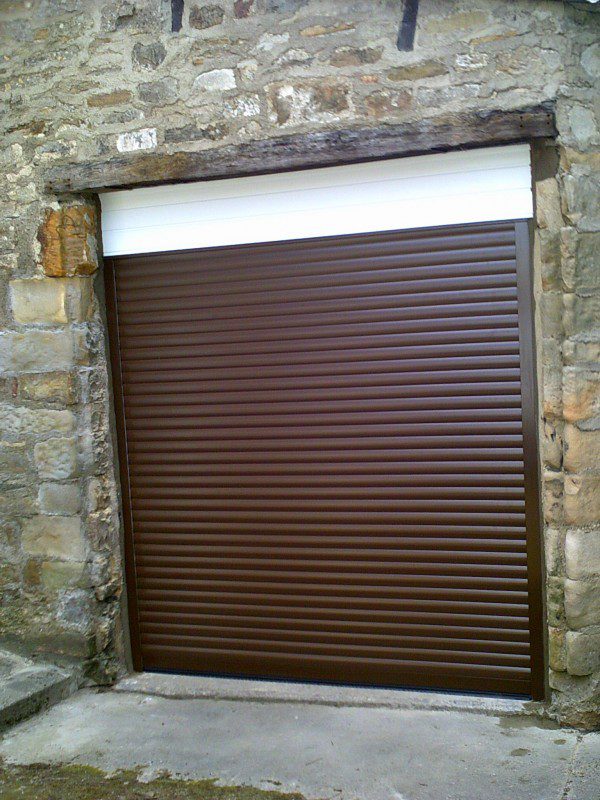 Seceuroglide Remote Control Insulated Rosewood Roller Style Garage Door  (After)