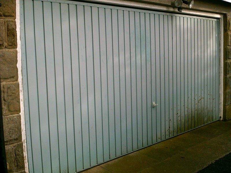 Blue Seceuroglide Remote Control Insulated Roller Garage Door (Before)
