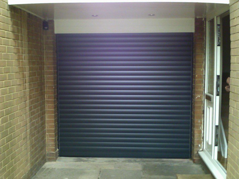 Seceuroglide Grey Remote Control Insulated Roller Garage Door (After)