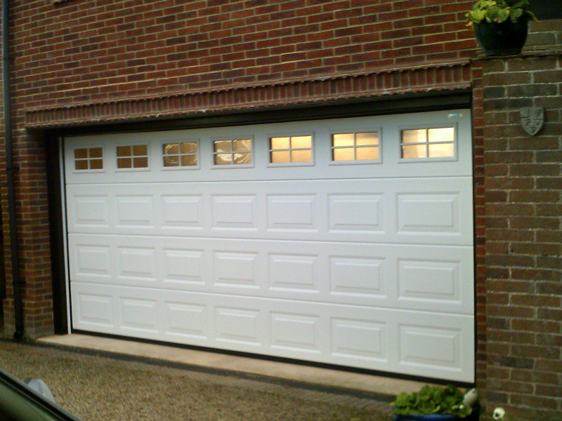 White Insulated Double Size Sectional Garage Door (After)