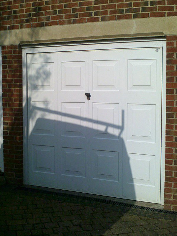 White Seceuroglide Remote Control Insulated Roller Garage Door (Before)