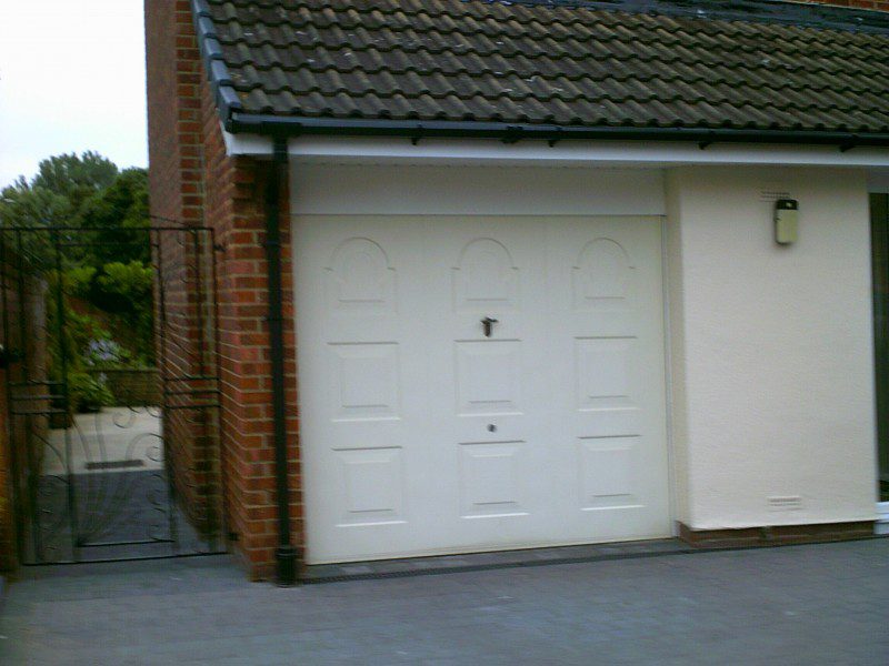 Cream Insulated Garador Sectional Garage Door (Before)