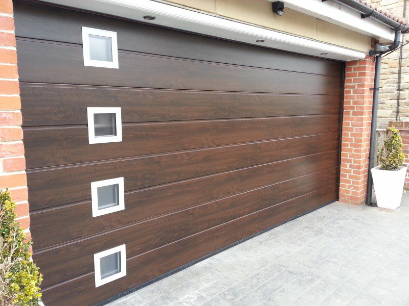 Night Oak Sectional Garage Door (After)