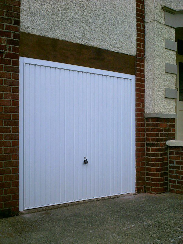 White Vertical Rib Style Garage Door (After)