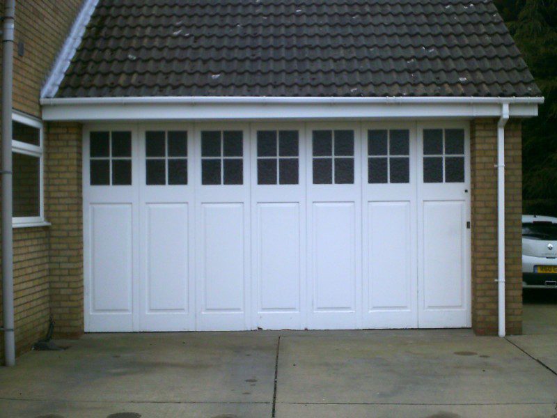 White Sectional Door with Windows (Before)