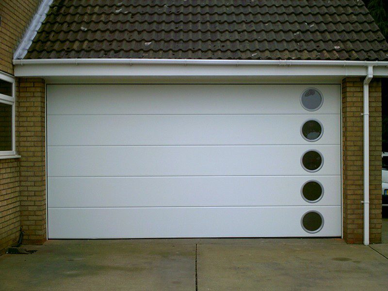 White Sectional Door with Windows (After)