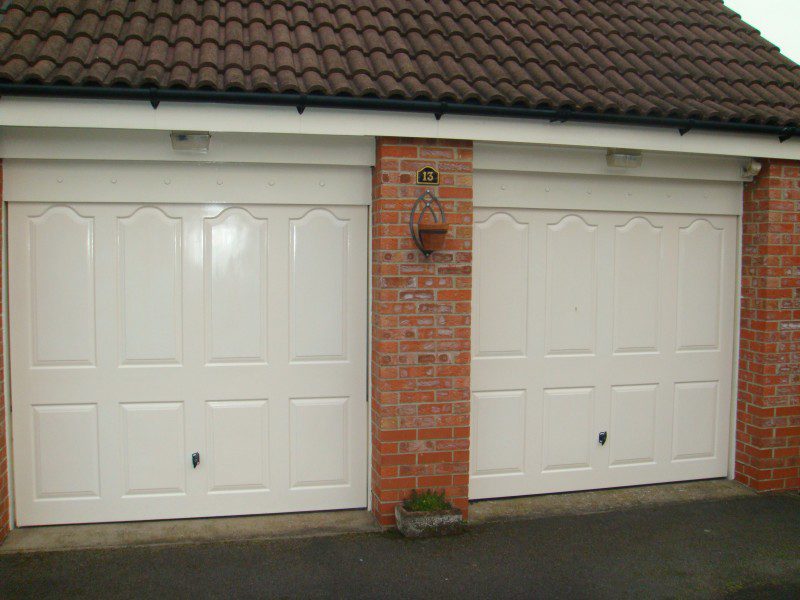 Cream Insulated Sectional Garage Doors (Before)