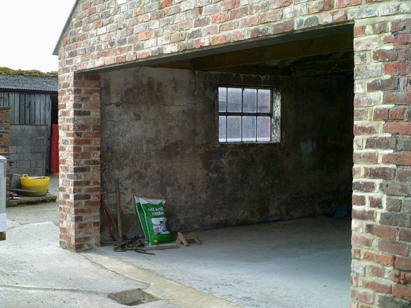 Red Double Insulated Sectional Garage Door (Before)