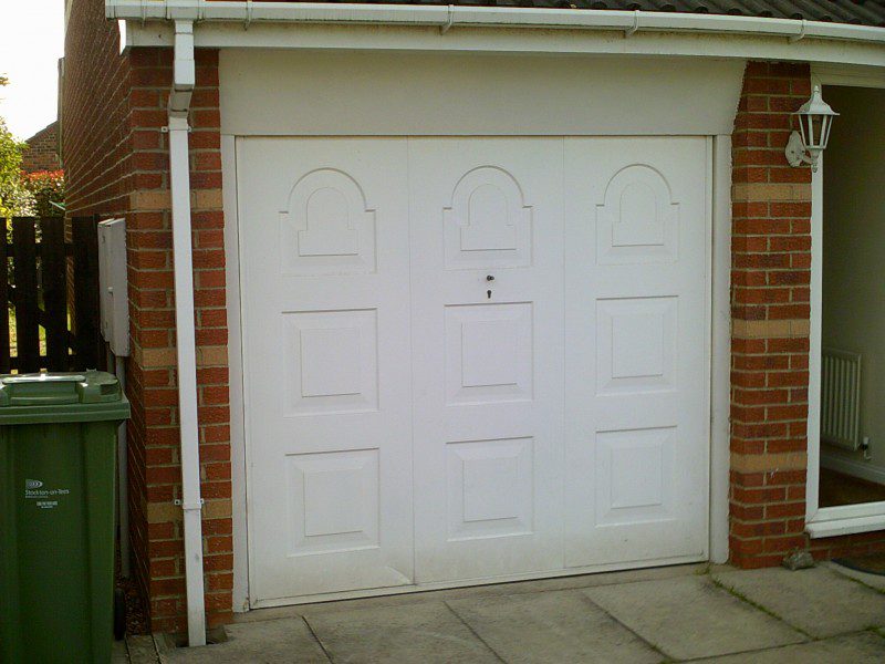 Georgian Style Sectional Garage Door (Before)