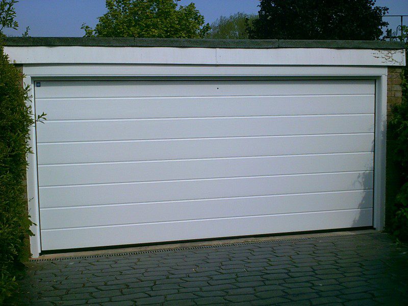 White Rib Style Sectional Garage Door (After)