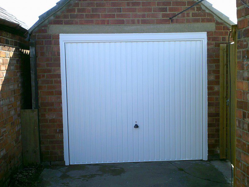 White Rib Style Up and Over Garage Door  (After)