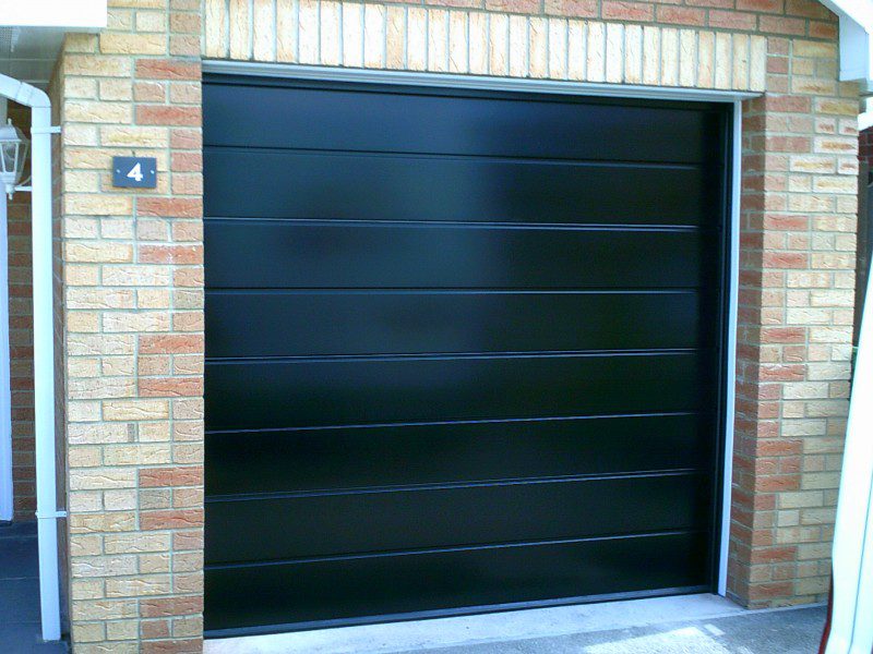 Black Insulated Rib Sectional Garage Door (After)