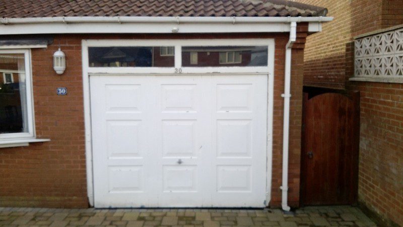 White Sectional Garage Door (Before)