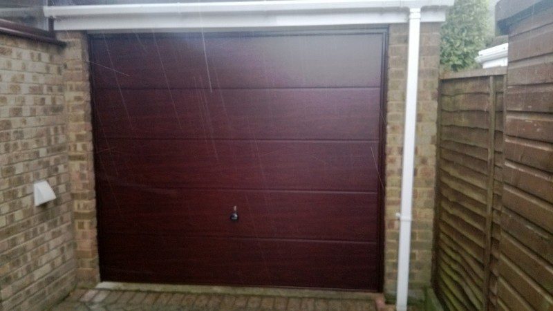 Rosewood Sectional Garage Door (After)