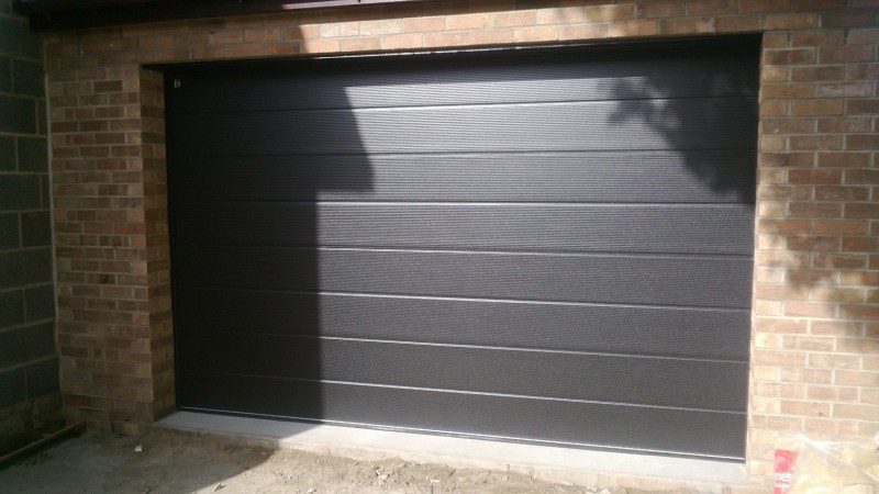 Black Micro Rib Style Sectional Garage Door (After)