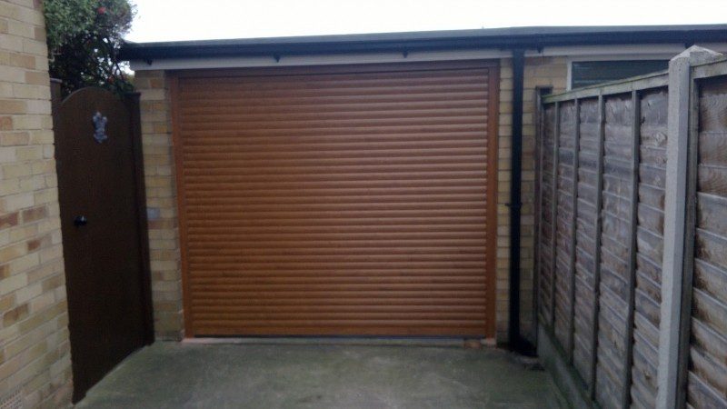 Golden Oak Laminated Insulated Roller Door (After)