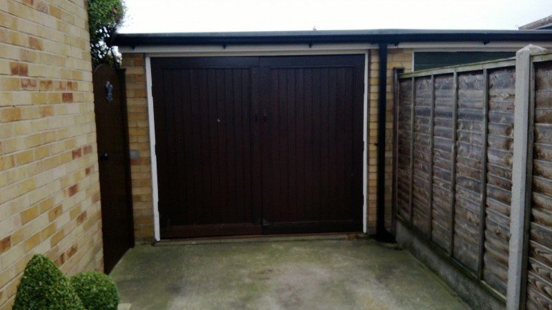 Golden Oak Laminated Insulated Roller Door (Before)