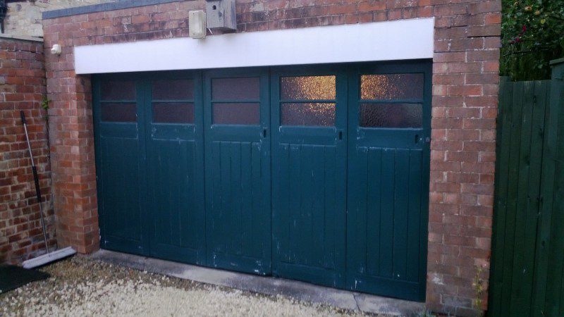 Black Sectional Garage door (Before)