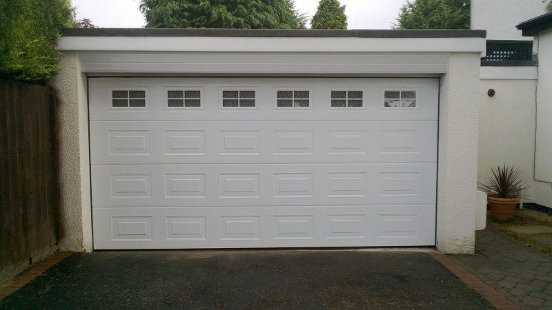 White Sectional Garage Doors with windows (After)