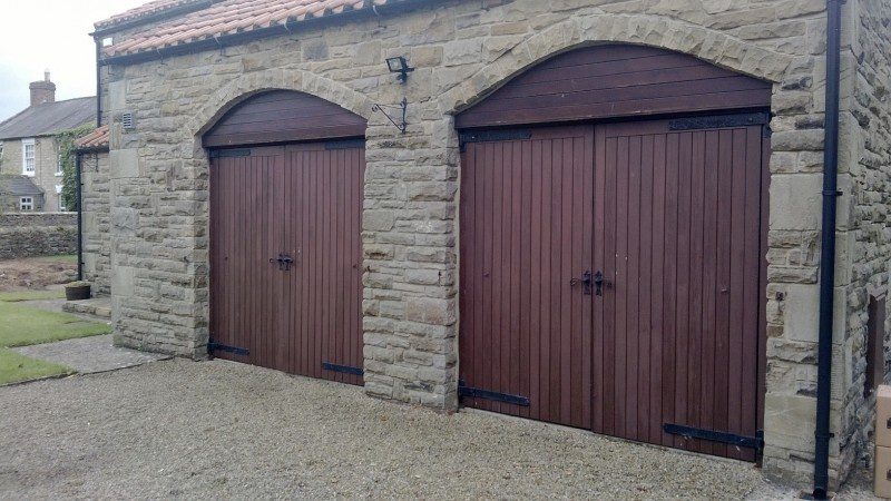 Rosewood Laminated Insulated Roller Doors (Before)