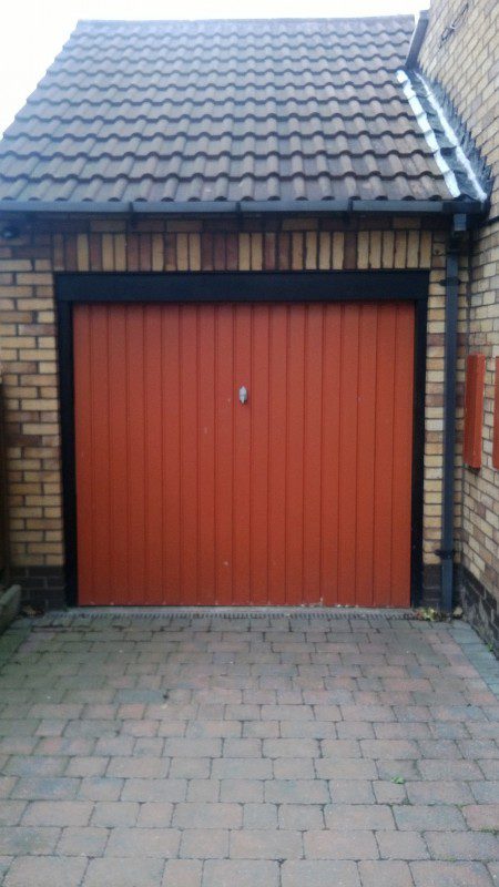 Red Insulated Roller Door (Before)