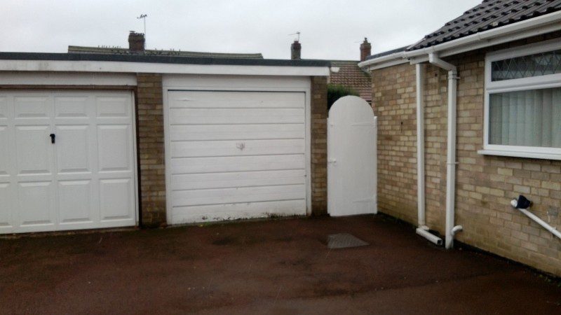 Cathedral up and over garage door (Before)