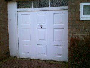 Blue Insulated Roller Garage Door  (Before)