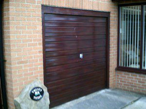 White Georgian Sectional Garage Door (Before)