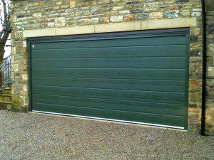 Green Sectional Garage Door (After)