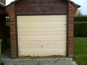 White Horizon Up and Over Garage Door (Before)