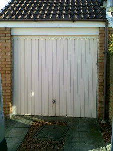 White Carlton Up and Over Garage Door (Before)