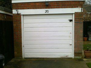 White Horizon Up and Over Garage Door (Before)