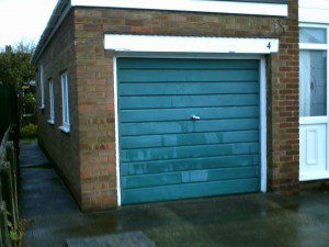 Green Up and Over Garage Door (Before)