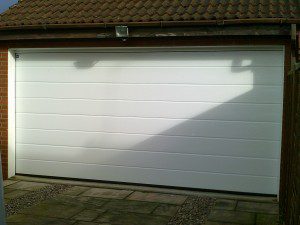 White Sectional Garage Door (After)