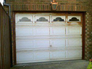 White Georgian Sectional Garage Door (Before)