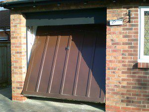 Red Insulated Roller Garage Door (Before)