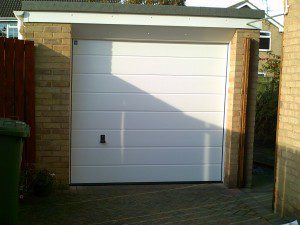 White Sectional Garage Door (After)