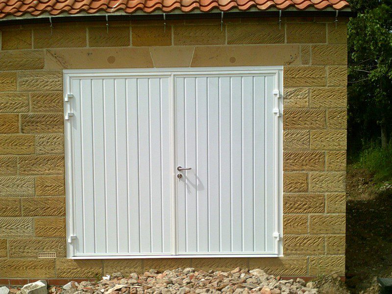 White Insulated Rib Style Side Hinged Garage Door (After)