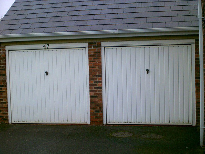 Two Single Sectional Garage Doors (Before)