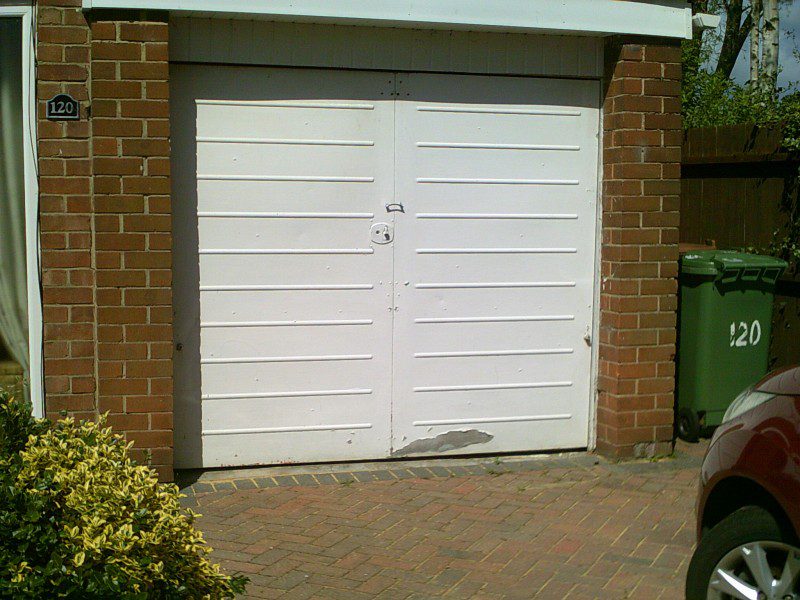 White Roller Garage Door (Before)